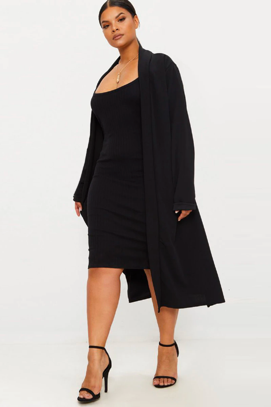 Model Woman Wearing A Black Open Front Plus Size Crepe Longline Duster Cardigan