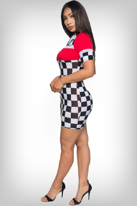 Model Wearing A Beautiful Checkered Short Sleeve Mini Dress, With Red Contrast & A Zip-Up Neckline