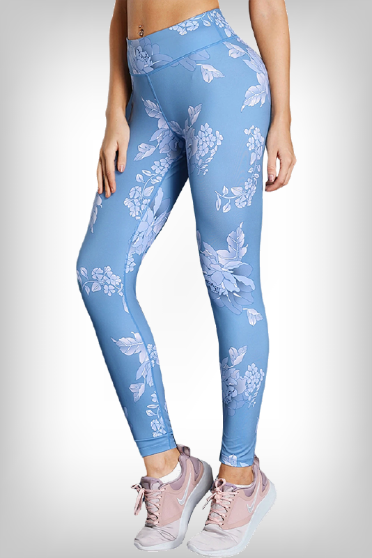 Model Wearing Sky Blue High-Rise Performance Yoga Leggings, With Floral Design