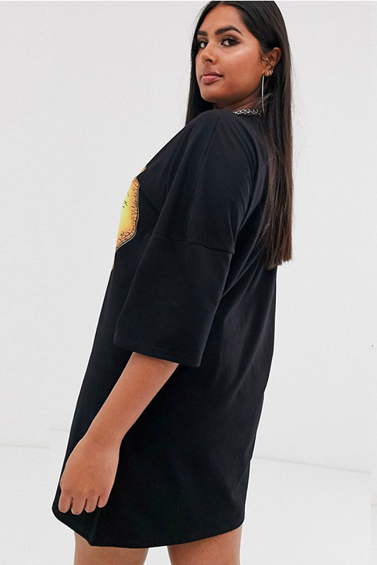 Model Woman Wearing A Black Oversized T Shirt Dress, With A Star And Moon Symbol