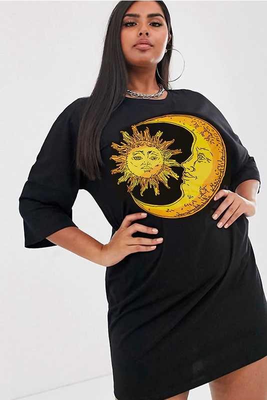 Model Woman Wearing A Black Oversized T Shirt Dress, With A Star And Moon Symbol