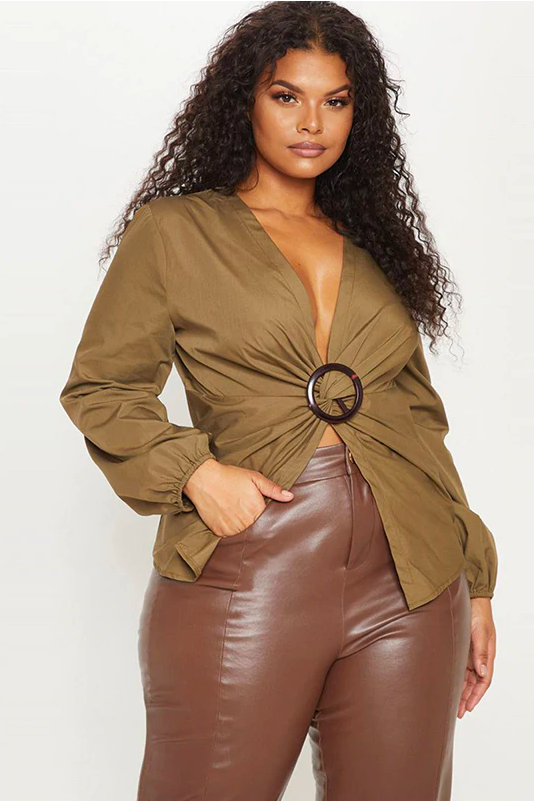 Model Woman Wearing A Khaki O-Ring Belted Woven Plus Size Faux Wrap Top, With A Plunging Neckline